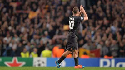 AS Roma's Francesco Totti applauds the Roma fans as he leaves the field to be substituted during his side's Champions League draw against Manchester City on Tuesday night. Peter Powell / EPA / September 30, 2014