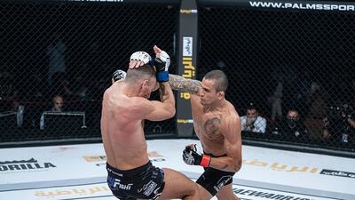 Bruno Machado lands one on Mickael Lebout in the Lightweight title fight at the UAE Warriors 15 on Friday, January 15, 2021. Courtesy UAE Warriors