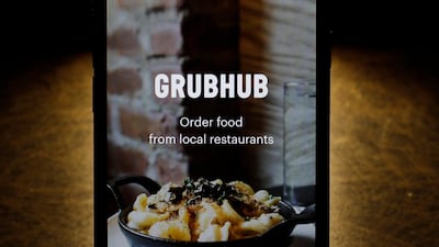 Amsterdam-based Just Eat Takeaway.com is acquiring Chicago-based Grubhub in a $7.3 billion deal that will create one of the world's largest restaurant delivery companies. AP