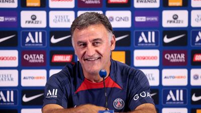 Paris Saint-Germain's head coach Christophe Galtier smiles during a press conference at the Camp des Loges. AFP