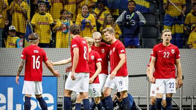 Erling Haaland celebrates with teammates after scoring Norway's second goal against Sweden. Reuters