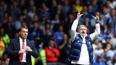 Chelsea manager Jose Mourinho and his Liverpool counterpart Brendan Rodgers react during their sides' clash on Sunday. Darren Staples / Reuters / April 27, 2014