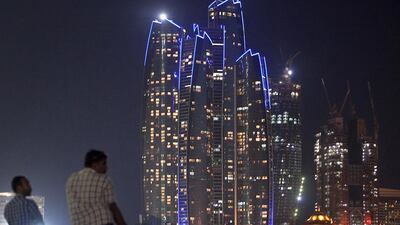 The Etihad Towers on Abu Dhabi's Corniche lit up the International Property Awards. Silvia Razgova / The National