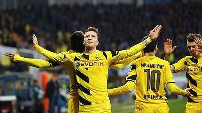Marco Reus of Dortmund celebrates after scoring the second goal during the Bundesliga match between SC Paderborn and Borussia Dortmund at Benteler Arena on November 22, 2014 in Paderborn, Germany. (Photo by Martin Rose/Bongarts/Getty Images)
