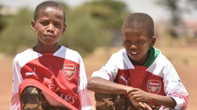 The boys were ecstatic to receive a parcel from Mesut Ozil. Courtesy @MesutOzil1088 / Twitter