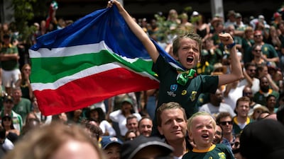 South African fans celebrate at the Pirates Rugby Club in Johannesburg, South Africa after their team's victory in the Rugby World Cup final between South Africa and England being played in Tokyo, Japan. South Africa defeated England 32-12. AP Photo