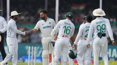 Bangladesh players congratulate Virat Kohli, second left, after India won the Kanpur Test on the fifth and final day on Tuesday, October 1, 2024. AP