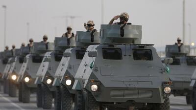 Armoured vehicles rolling in during the parade. Faisal Al Nasser/Reuters
