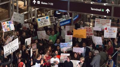 A protest against Donald Trump’s immigration ban at Ronald Reagan National Airport in Virginia. The new US president’s policies have been protectionist and isolationist in nature, not deregulatory as business analysts had hoped. Paul Richards / AFP