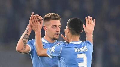 Lazio's Sergej Milinkovic-Savic celebrates scoring their second goal with Luiz Felipe. Reuters