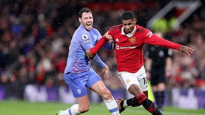 Bournemouth's Adam Smith attempts to hold back Marcus Rashford of Manchester United. Getty