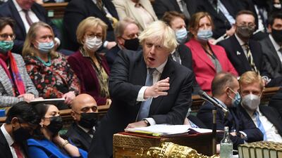Boris Johnson during the Prime Minister's Questions at the House of Commons. Johnson faced questions amid allegations that Downing Street staff held a Christmas party during the Covid-19 lockdown 2020. EPA