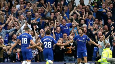 Marcos Alonso, right, celebrates after scoring Chelsea's winning goal against Arsenal. AP Photo