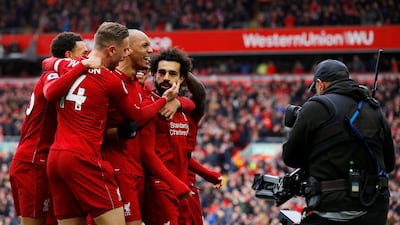 Mohamed Salah celebrates after scoring Liverpool's second goal, which sealed the game against Chelsea on Sunday. Phil Noble / Reuters