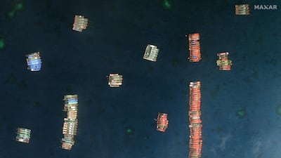 A handout satellite image made available by Maxar Technologies shows Chinese vessels anchored at the Whitsun Reef in the disputed South China Sea on March 23, 2021. EPA photo