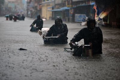 Tamil Nadu reported 14 deaths due to flooding. EPA