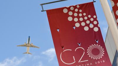 A jet liner flies over the G20 summit venue. AP