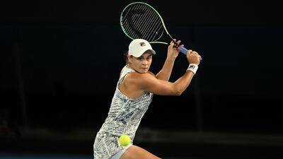 Australia's Ashleigh Barty hits a return against Danielle Collins. AFP