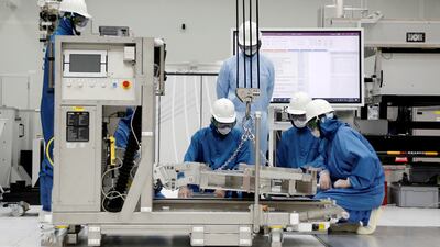 Trainees learn how to build and operate an EUV machine, which makes advanced semiconductors, in Taiwan. Reuters