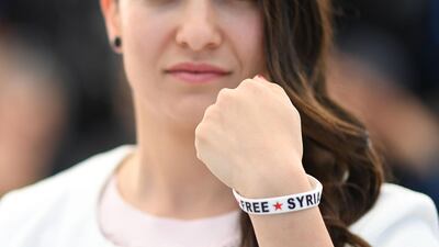 Syrian director and producer Waad al-Kateab poses during a photocall for the film "For Sama" at the 72nd edition of the Cannes Film Festival in Cannes, southern France, on May 16, 2019. The film won the Golden Eye Documentary Prize at the film festival. AFP