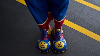 A clown’s shoes are seen before a parade during a Clown Festival.