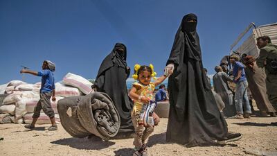 A group of Syrian families is released from the Kurdish-run Al Hol camp, which holds relatives of suspected ISIS fighters. AFP