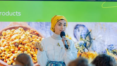 Dr Meriem Hammal teaches pupils about apiary care and pollination. Photo: Terra / Expo City Dubai