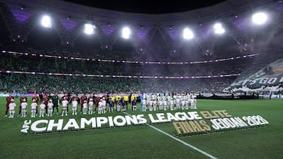 Al Ahli and Vissel Kobe players line-up ahead of the match at King Abdullah Sports City. Getty Images