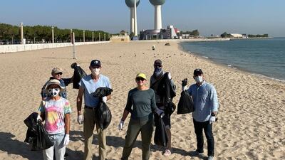 Alina L Romanowski, the US envoy to Kuwait, takes part in a cleanup campaign at Asheraj beach to mark World Cleanup Day. Photo: US ambassador to Kuwait