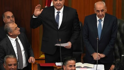 This handout photo released by the Lebanese parliament shows Newly elected Lebanese president Joseph Aoun (L) standing next to the parliament speaker Nabih Berri as he delivers a speech during a parliamentary session to elect a president, in Beirut, on January 9, 2025. Lebanese army chief Joseph Aoun, the frontrunner in today's vote for president, is seen as a man of integrity best placed to maintain a fragile ceasefire and pull the country out of financial collapse. (Photo by LEBANESE PARLIAMENT / AFP) / XGTY / === RESTRICTED TO EDITORIAL USE - MANDATORY CREDIT "AFP PHOTO / HO / Lebanese Parliament " - NO MARKETING - NO ADVERTISING CAMPAIGNS - DISTRIBUTED AS A SERVICE TO CLIENTS ===