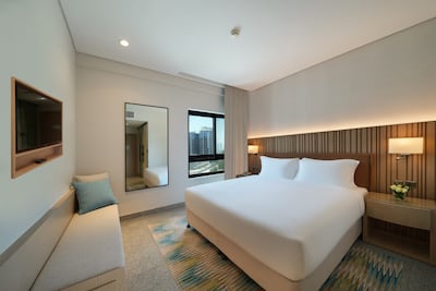 Rooms and suites are available for longer periods. Photo: Al Jaddaf Rotana Suite Hotel