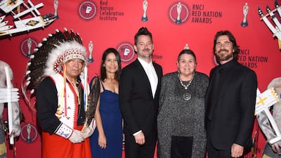 Chief Phillip Whiteman Jr, Rebecca Brando, Scott Cooper, Sacheen Littlefeather and Christian Bale at the 24th RNCI Red Nation International Film Festival and Awards Ceremony on November 15, 2019 in Beverly Hills, California. AFP