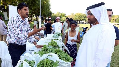 Locally grown organic greens and vegetables are displayed during the Grow Your Food Campaign in Zabeel Park. Satish Kumar / The National