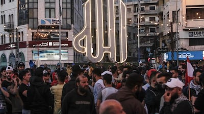Several hundred Lebanese people protest in the northern city of Tripoli on April 17, 2020 despite the country's coronavirus lockdown. AFP