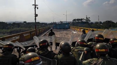 Members of the Venezuelan National Guard guard the Simon Bolivar international bridge leading to Colombia on February 24, 2019. AFP