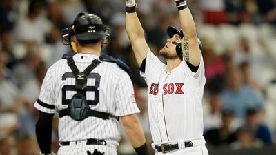 Boston Red Sox's Michael Chavis celebrates his three-run home run against the New York Yankees during the seventh inning of a baseball game in London. Major League Baseball made its European debut game Saturday at London Stadium. AP