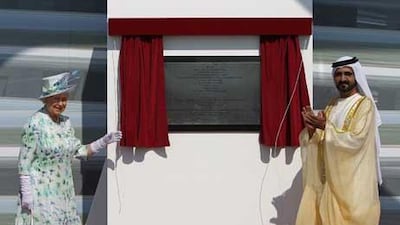 Sheikh Mohammed unveils a plaque to mark the construction of the Zayed National Museum with Queen Elizabeth II of Britain last year.