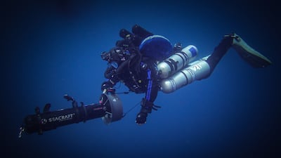 Mr Nadim using a scooter to dive. Photo: Khaled Alobaidli / XR Hub