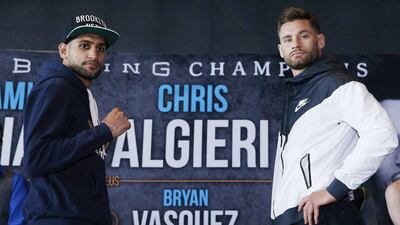 Amir Khan, left, and Chris Algieri square off ahead of their fight at the Barclays Center in New York on May 30. Andrew Couldridge / Reuters