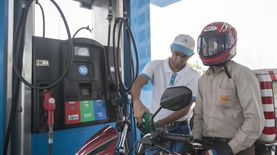 The price of petrol at the pump has fallen for the sixth consecutive month, with a litre of special costing Dh1.47. Mona Al Marzooqi / The National