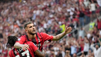 AC Milan's Theo Hernandez celebrates with Rafael Leao, left, after scoring his side's second goal against Atalanta at the San Siro. AP Photo