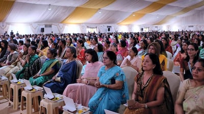 People attend the foundation stone laying ceremony.