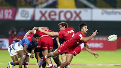 Nathan Hirayama of Canada passes the ball in the match against Samoa in Dubai. Chris Whiteoak / The National