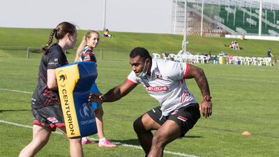 Coach Epeli Davetawalu leads the training of Dubai Exiles U19 girls at The Sevens Stadium.