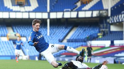 Everton's Anthony Gordon is challenged by Matthew Olosunde of Rotherham at Goodison Park. Getty