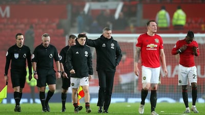 Manchester United manager Ole Gunnar Solskjaer consoles Daniel James after the defeat to Burnley. Getty Images