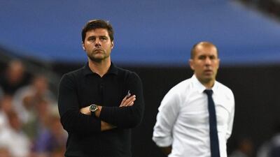 Mauricio Pochettino, left, was not pleased with his players' effort in the defeat to Monaco. Shaun Botterill / Getty Images