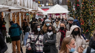 Shoppers at a Christmas market in the Tuileries Garden in Paris on December 20. AP