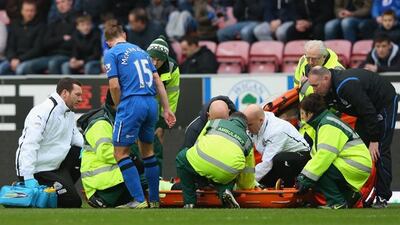 Callum McManaman checks on Massadio Haidara after his tackle. Alex Livesey/Getty