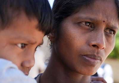 A woman cries after losing her neighbours and being forced to evacuate her home following landslides after Cyclone Ditwah pounded Kandy, Sri Lanka. Reuters